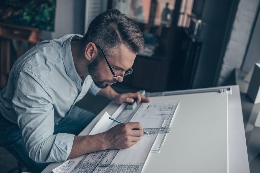 Young architect in the studio